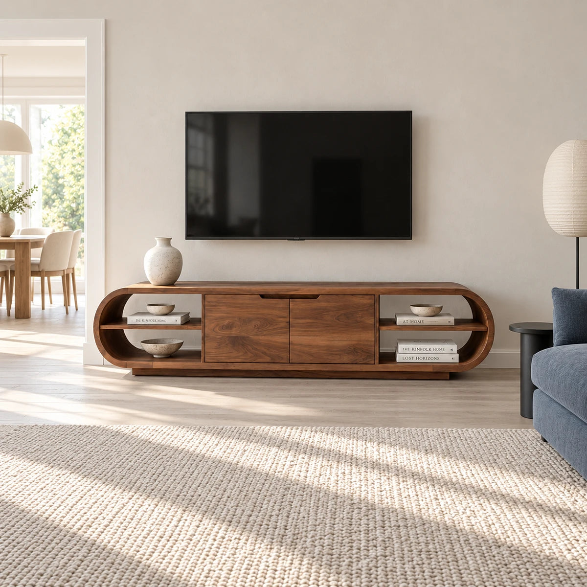 Low profile entertainment center in solid wood with shelving and hidden cabinet space
