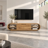 Streamlined TV media unit in solid wood with open shelves and low cabinet profile
