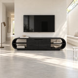 Designer media stand in solid wood with curved silhouette and practical storage space

