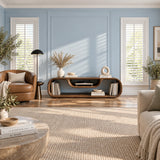 Modern media console in solid wood with rounded ends and a display shelf below the top
