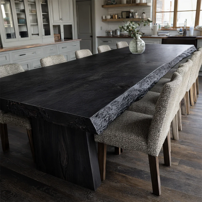 Bright open kitchen featuring a contemporary dining table with smooth finish and rich grain