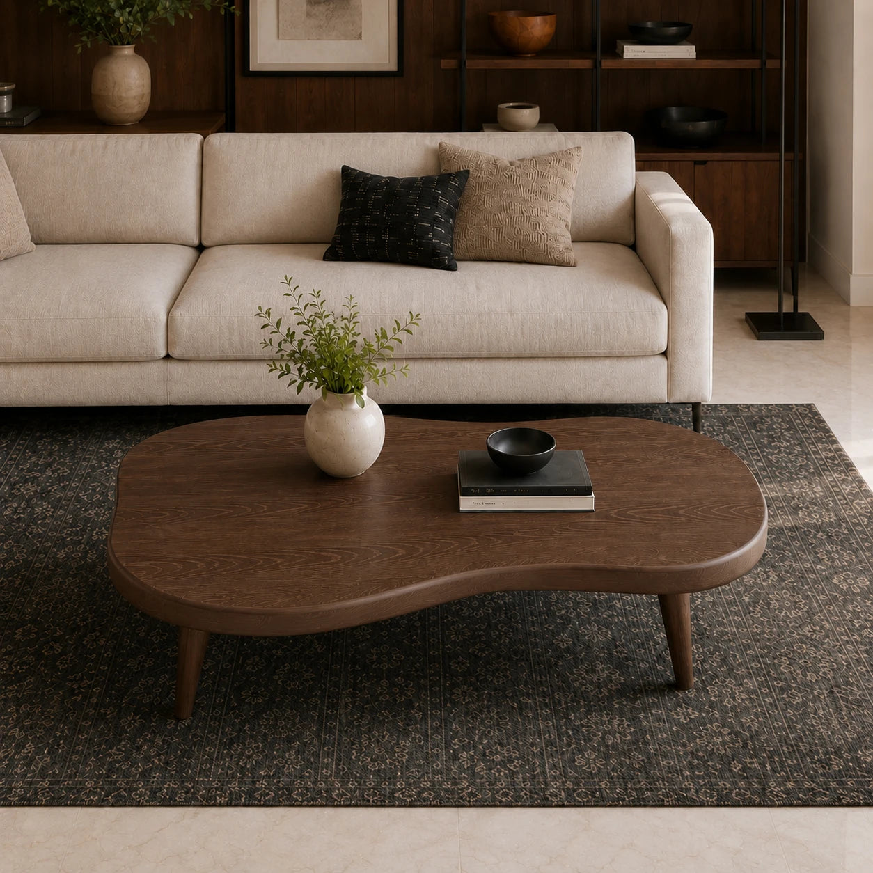 Low profile coffee table with curved corners and slender legs in an elegant city interior
