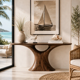 Contemporary console table showcases a fluid support design in an airy coastal setting