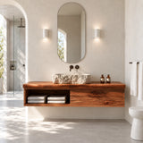 Clean lined bathroom vanity in natural solid wood with open shelf and drawer storage
