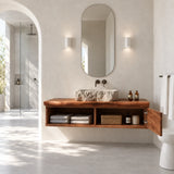 Elegant floating vanity in natural solid wood with drawer storage and towel shelf below