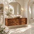 Floating bathroom vanity in natural solid wood with a seamless modern cabinet front