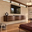 Floating solid wood TV stand with minimalist wall-mounted storage and clean lines
