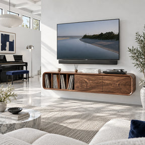 Floating TV stand in solid wood with vinyl storage and rounded drawer front design
