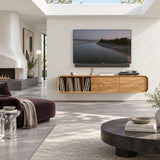 Minimalist entertainment unit in solid wood with record shelves and drawers below
