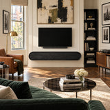 Streamlined floating TV stand in natural solid wood with concealed storage doors