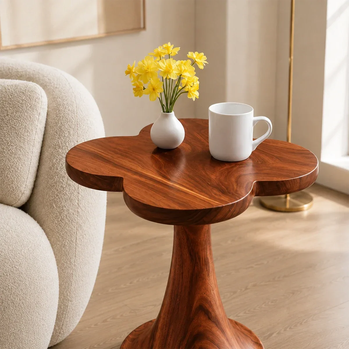 Accent end table featuring a flower shaped top and flared pedestal base indoors today
