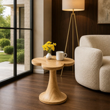 Statement end table with clover inspired top in a bright minimalist living room setting