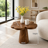 Minimalist side table with petal top and elegant pedestal profile for modern living spaces