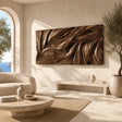 Abstract wall art with flowing carved relief adds depth to a refined modern interior
