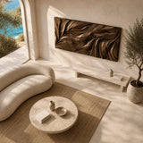 Textured wall sculpture with layered carved forms creates a bold architectural focal point