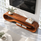 Designer entertainment unit in solid wood with soft curves and a floating shelf detail
