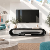 Minimalist entertainment stand in solid wood with flowing ends and shelf display
