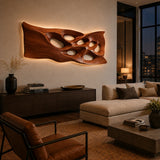 Flowing open form wall decor shapes a dramatic centerpiece for an elegant sleeping space