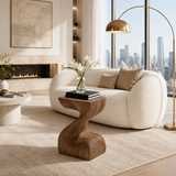 Statement end table with sweeping curves and visible grain in a minimalist room setting