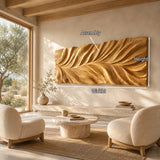 Textured wall art with layered relief forms enhances a spacious contemporary living area