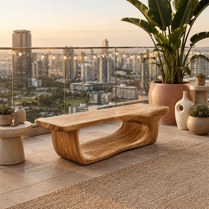 Sculptural bench with flowing curves creates artistic seating for a modern balcony