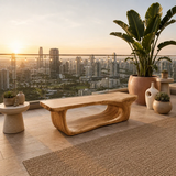 Organic modern bench features visible grain and a sweeping base for patio seating