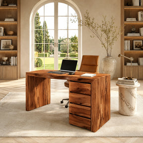 Executive desk with four drawer storage and broad worktop in a bright home office