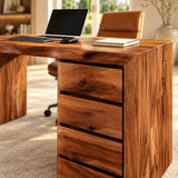 Featuring four stacked drawers, the desk keeps supplies organized in a refined workspace