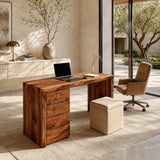 Executive desk with four drawers and broad worktop in a bright modern home office