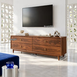 Refined entertainment console in solid wood with ring pulls and mid century appeal
