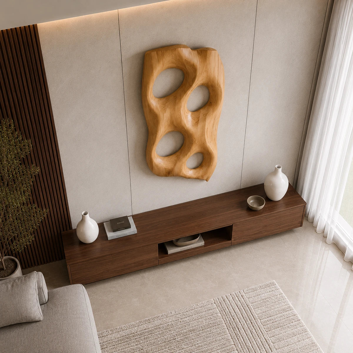 Vertical wall decor with four open forms adds artistic structure to contemporary rooms