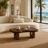 Minimalist coffee table with smooth freeform shape for elegant coastal living spaces