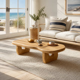 Statement coffee table with organic silhouette in a serene tropical living room setting