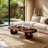 Contemporary coffee table showcases smooth curves and visible grain in a bright room