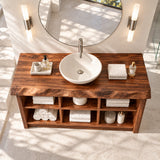 Architectural vanity cabinet in natural solid wood with layered open shelf storage