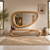 Sculptural bench with flowing solid wood frame and open base for a refined entryway space