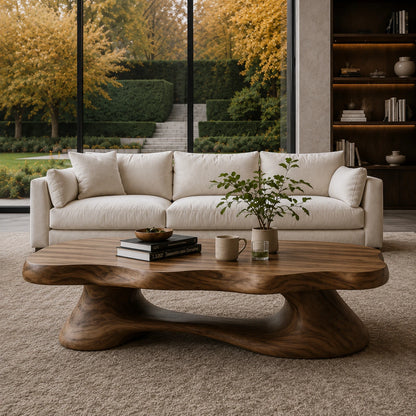 Freeform coffee table with smooth edges and bold solid wood foundation for modern rooms