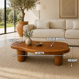 Artisan coffee table with natural flowing lines and a handcrafted solid wood foundation