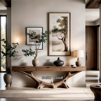 Elegant entry space centered around a wood console table with organic form and balanced design