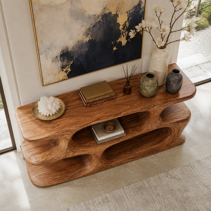 Narrow console table with layered shelving for refined foyer decor and storage indoors