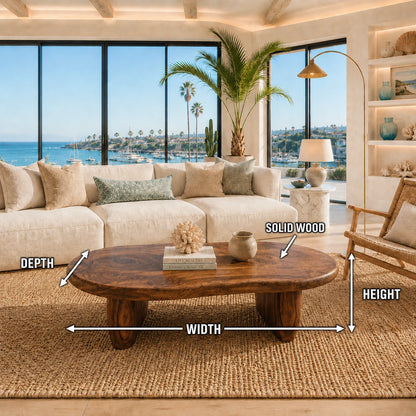 Artisan coffee table featuring a freeform top and sculpted base for relaxed interiors