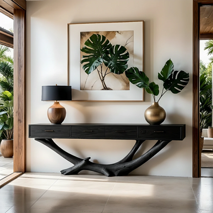 This entry space highlights a wood console table with organic base and functional storage design