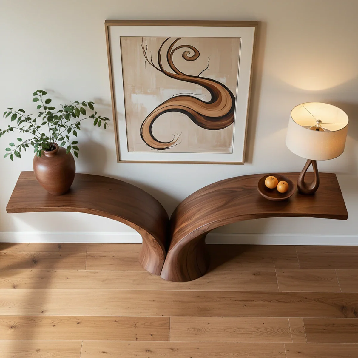 Natural wood console table with artistic shape enhances this clean and modern entryway design