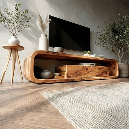 Curved wooden TV console with open shelf and storage drawers styled in a cozy modern living room