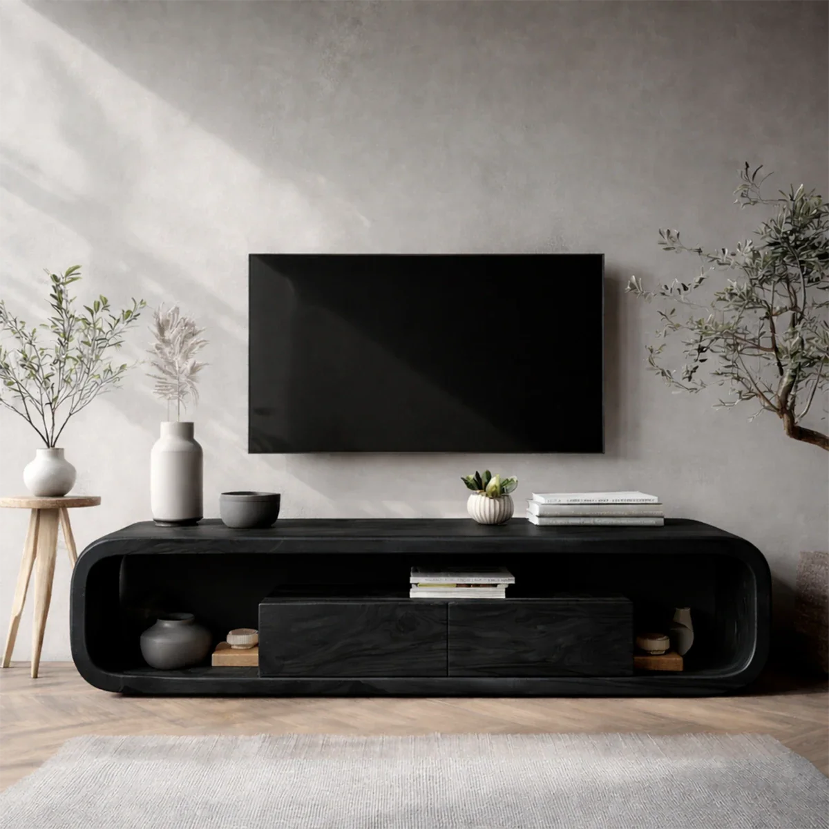 In this bright room, a curved edge media console offers storage and warm natural wood texture