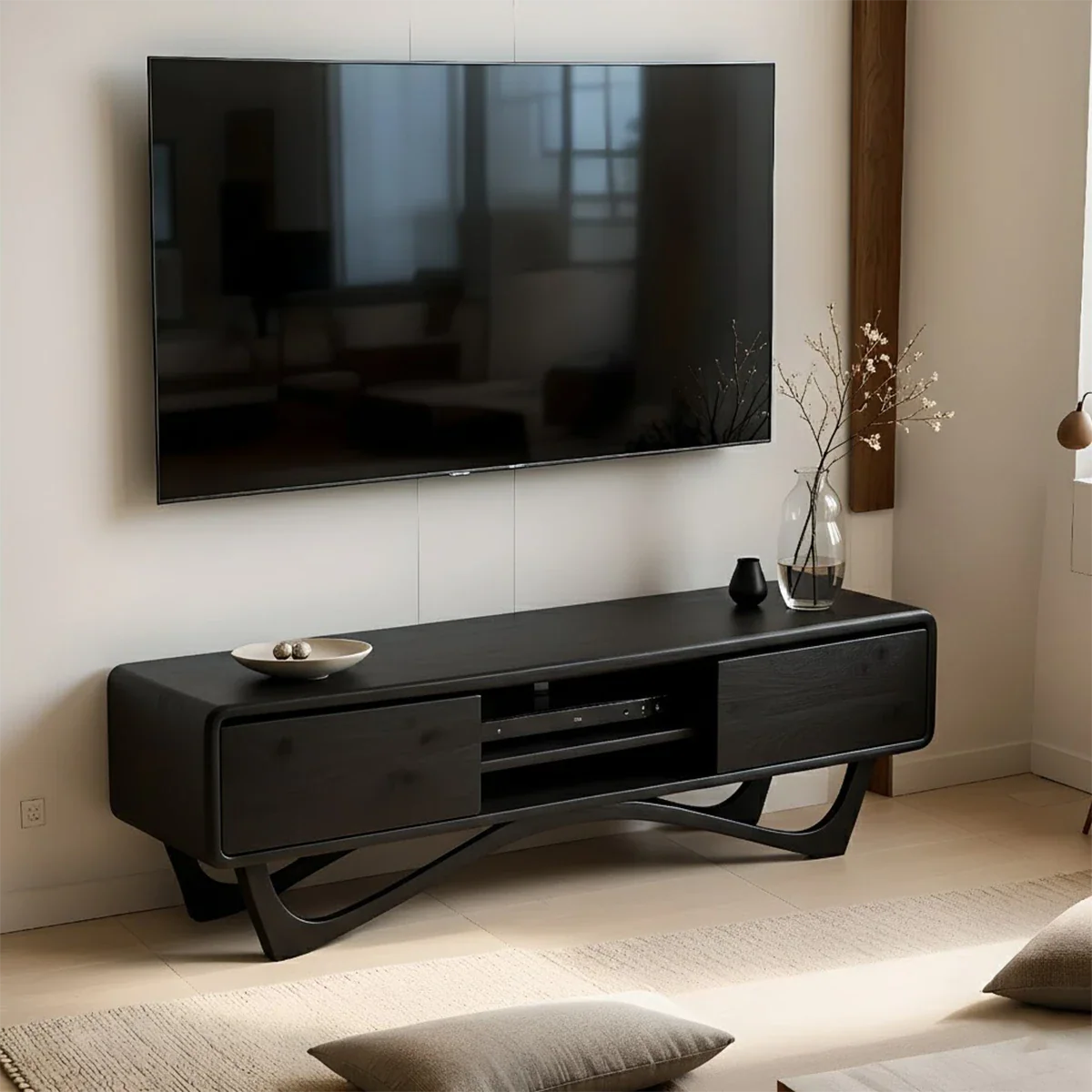 Crafted in a black color finish, this TV stand features clean structure and modern form