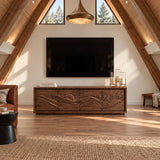 Functional media unit in solid wood with mountain carving and streamlined storage
