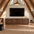 Solid wood TV stand with carved mountain sunrise doors and low-profile storage base
