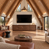 Modern media console in solid wood with scenic relief panels and broad silhouette
