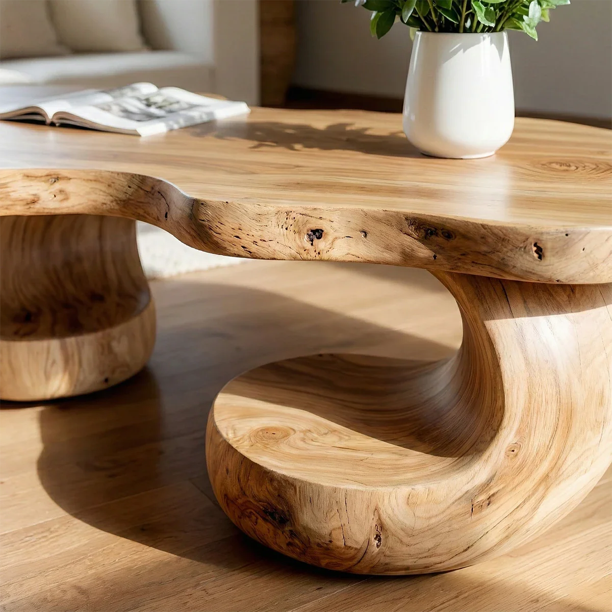 Oak coffee table with bright finish and simple base